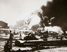 The wreckage-strewn Naval Air Station, Pearl Harbour, 7th December 1941