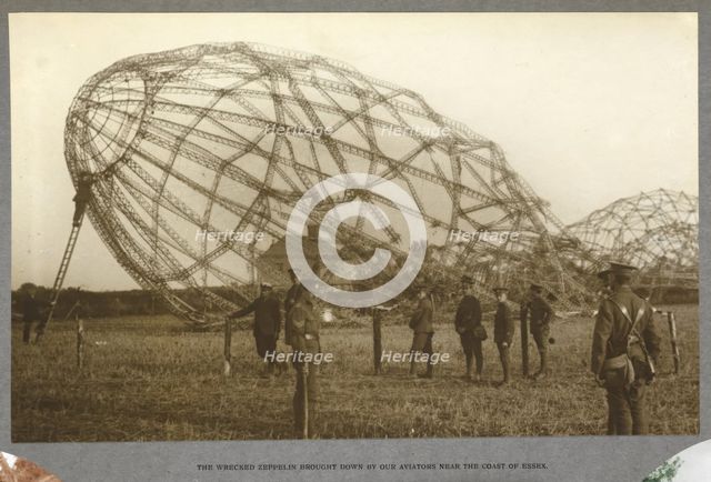The wrecked Zeppelin brought down by our aviators near the coast of Essex, 1915. (1921). Creator: HD Girdwood.
