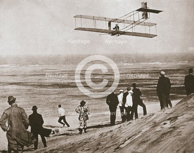 The Wright Brothers testing an early plane at Kitty Hawk, North Carolina, USA, c1903. Creator: Unknown.