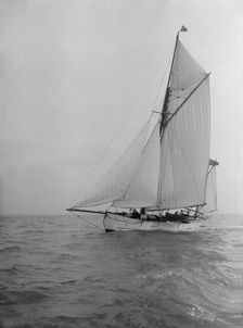 The yawl Colleen under way, 1912. Creator: Kirk & Sons of Cowes