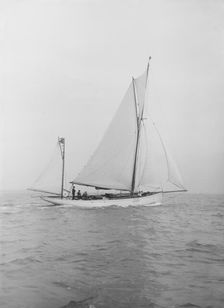 The yawl Colleen under way, 1912. Creator: Kirk & Sons of Cowes