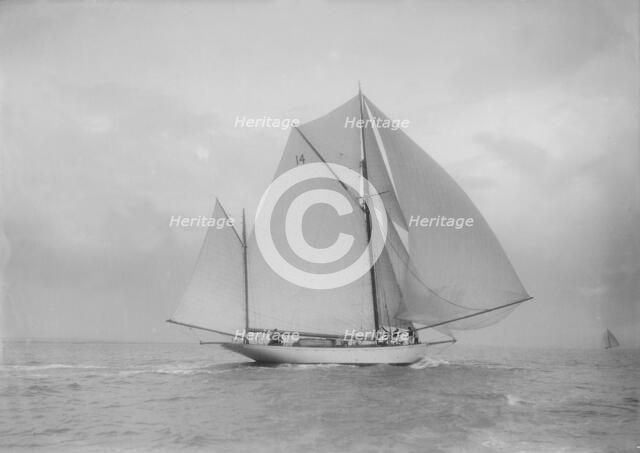 The yawl 'Celia' with full sail, 1912. Creator: Kirk & Sons of Cowes.