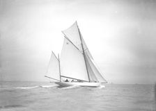 The yawl Celia under way, 1911. Creator: Kirk & Sons of Cowes