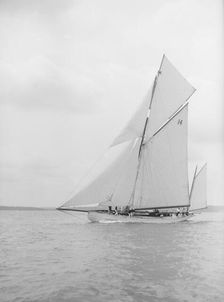 The yawl Celia under way, 1913. Creator: Kirk & Sons of Cowes