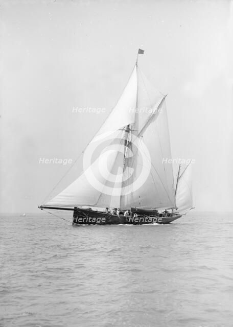 The yawl 'Adelaide' under sail, 1913. Creator: Kirk & Sons of Cowes.