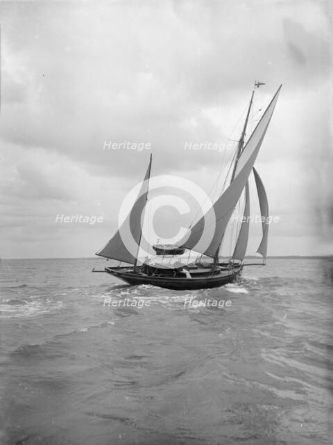 The yawl 'Moosk' under way, 1912. Creator: Kirk & Sons of Cowes.
