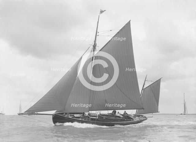 The yawl 'Moosk' under way, 1912. Creator: Kirk & Sons of Cowes.