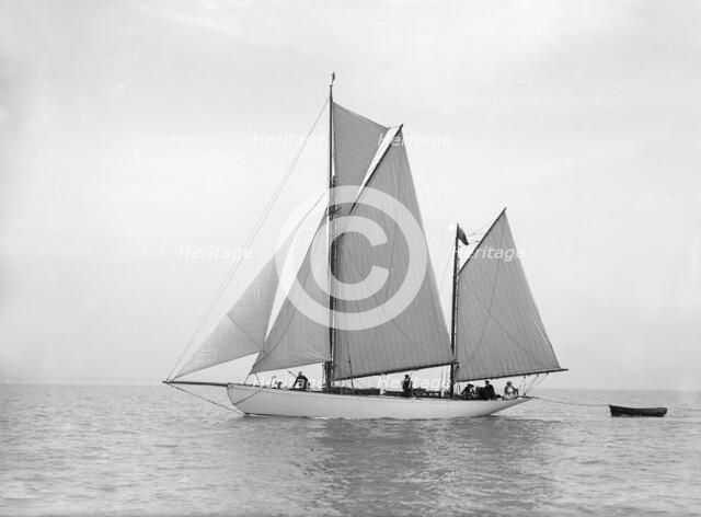 The yawl 'Meander' sailing in close-hauled, 1913. Creator: Kirk & Sons of Cowes.