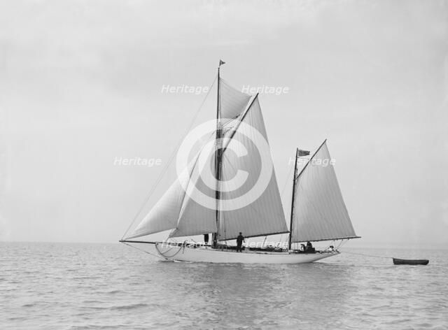 The yawl 'Meander' sailing in fine conditions, 1913. Creator: Kirk & Sons of Cowes.