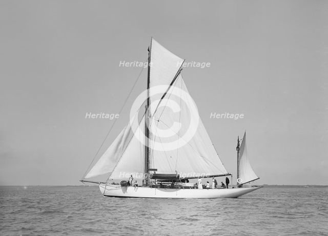 The yawl 'Suzanne' under sail, 1911. Creator: Kirk & Sons of Cowes.