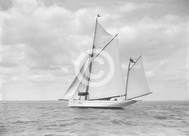 The yawl 'Pleiad' under sail, 1911. Creator: Kirk & Sons of Cowes.