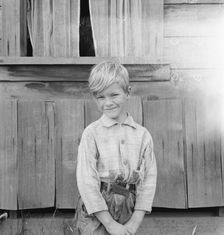 The youngest Arnold boy who also works at land clearing, Michigan Hill, Western Washington, 1939. Creator: Dorothea Lange