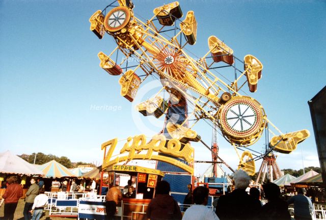 The 'Zipper' ride, Goose Fair, Forest Recreation Ground, Nottingham, Nottinghamshire, 1985. Artist: Reg Baker