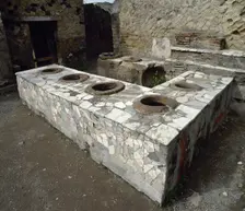 Thermopolium, between Cardo V and Lower Decumanu, Pompeii, Italy, 2002. Creator: LTL
