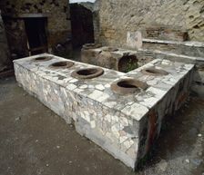 Thermopolium, between Cardo V and Lower Decumanu, Pompeii, Italy, 2002. Creator: LTL