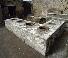 Thermopolium, between Cardo V and Lower Decumanu, Pompeii, Italy, 2002. Creator: LTL
