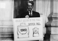 Theron Akin, Rep. from New York; with Full Dinner Pail Placard, 1913. Creator: Harris & Ewing