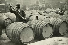 "There Are a Quarter of a Million Gallons of Port in the Port Vaults" - Wine Gauging Ground 1937. Creator: Fox