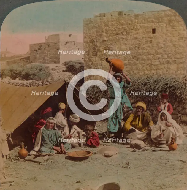 There's no place like home! - dwelling and shop of a Gypsy Blacksmith, Syria, 1900. Artists: Elmer Underwood, Bert Elias Underwood.