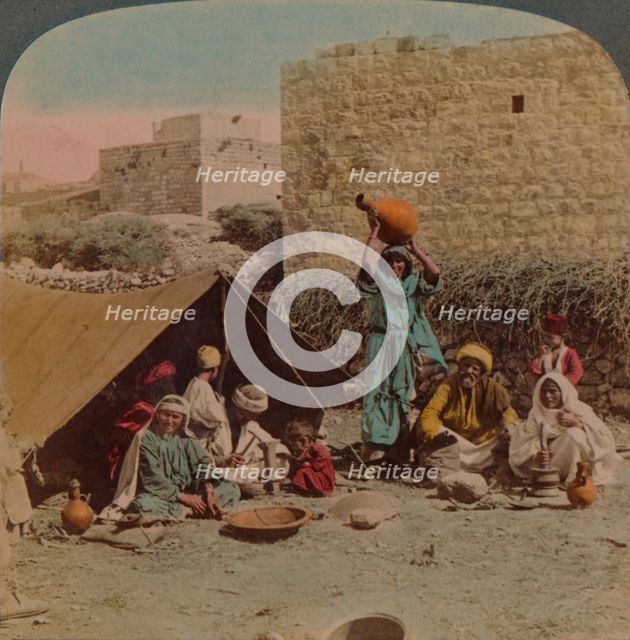 There's no place like home! - dwelling and shop of a Gypsy Blacksmith, Syria, 1900. Artists: Elmer Underwood, Bert Elias Underwood.