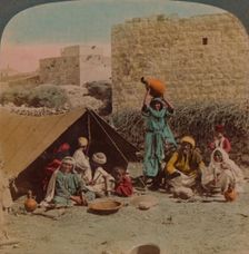 There's no place like home! - dwelling and shop of a Gypsy Blacksmith, Syria, 1900. Artists: Elmer Underwood, Bert Elias Underwood