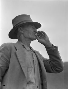 This man is a labor contractor in the pea fields of California, 1936 Creator: Dorothea Lange