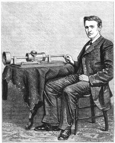 Thomas Alva Edison, American inventor, with an early hand-driven model of his phonograph, 1878. Creator: Unknown