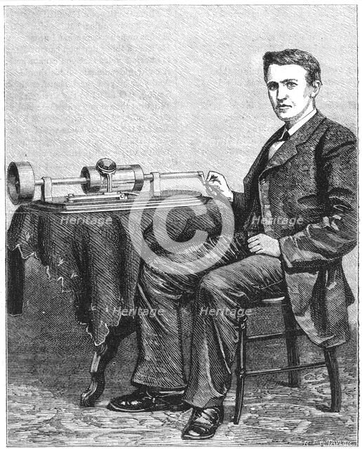 Thomas Alva Edison, American inventor, with an early hand-driven model of his phonograph, 1878. Artist: Unknown