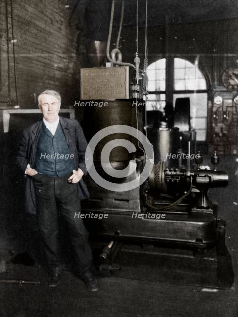 Thomas Alva Edison, American inventor, with his first dynamo for producing electric light, 1880s. Artist: Unknown.