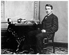 Thomas Alva Edison, American inventor, with his phonograph, c1878 (1955)