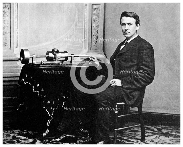 Thomas Alva Edison, American inventor, with his phonograph, c1878 (1955). Artist: Unknown
