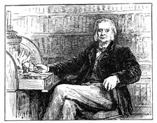 Thomas Henry Huxley, British biologist, at his desk, c1880. Creator: Unknown