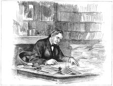 Thomas Henry Huxley, British biologist, at his desk in 1882 (1883). Creator: Unknown