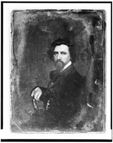 Thomas Hicks, half-length portrait, body in profile to left, facing front, between 1844 and 1860. Creator: Mathew Brady