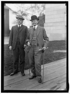 Thomas Riley Marshall (right) with unidentified man, between 1913 and 1917. Creator: Harris & Ewing