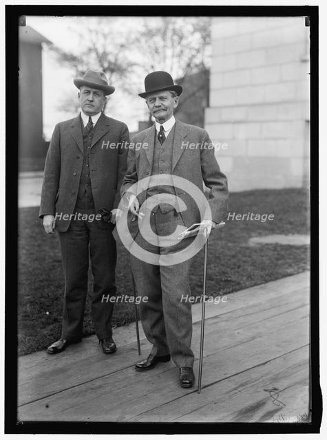 Thomas Riley Marshall (right) with unidentified man, between 1913 and 1917. Creator: Harris & Ewing.