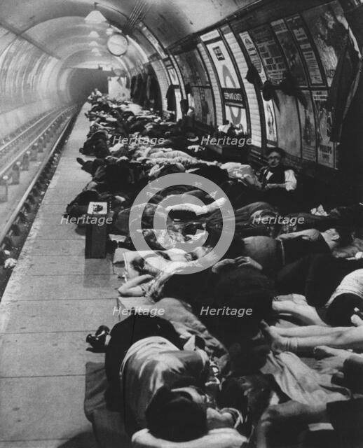 'Those who went to shelters began a new kind of night-life, 11th November, 1940', 1942. Artist: Unknown.