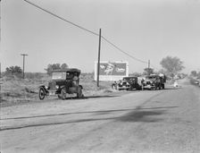 Three carloads of Mexicans headed for the Imperial Valley to harvest peas, near Bakersfield, CA,1936 Creator: Dorothea Lange
