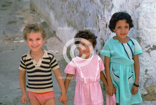 Three children in Kairouan, Tunisia. Artist: Unknown