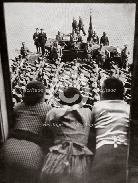 Three girls watching the traditional parade of SA stormtroopers, Nuremberg, Germany, c1923-1938. Artist: Unknown