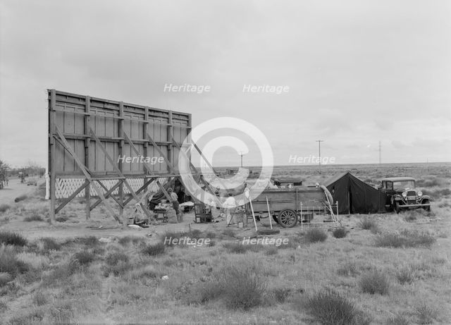 Three families camped on the plains along US99 in California, 1938. Creator: Dorothea Lange.