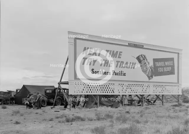 Three families camped on the plains along US 99 in California, 1938. Creator: Dorothea Lange.