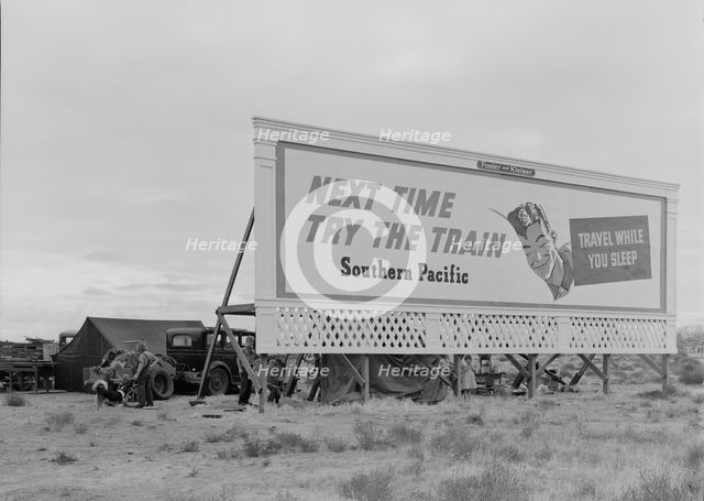 Three families camped on the plains along US 99 in California, 1938. Creator: Dorothea Lange.