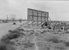 Three families camped on the plains along US 99 in California, 1938. Creator: Dorothea Lange