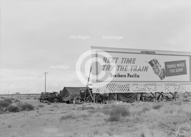 Three families camped on the plains along US 99 in California, 1938. Creator: Dorothea Lange.