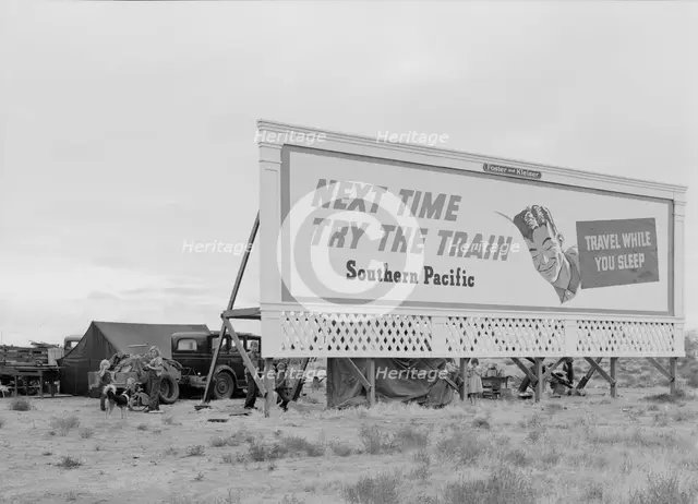 Three families camped on the plains along US 99 in California, 1938. Creator: Dorothea Lange.