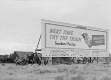 Three families camped on the plains along US 99 in California, 1938. Creator: Dorothea Lange