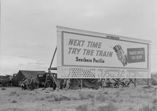 Three families camped on the plains along US 99 in California, 1938. Creator: Dorothea Lange