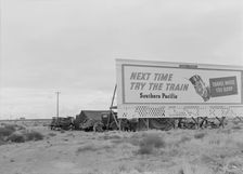 Three families camped on the plains along US 99 in California, 1938. Creator: Dorothea Lange