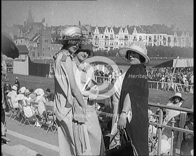 Three Female Civilians Wearing Smart Summer Outfits Posing for the Camera in a Horse Race, 1920. Creator: British Pathe Ltd.